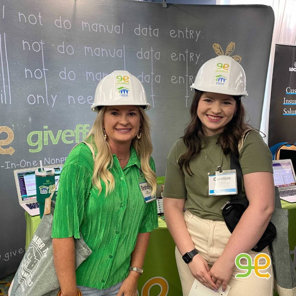 Two women from Habitat for Humanity Affiliates participating in the construction hat selfie contest with Giveffect